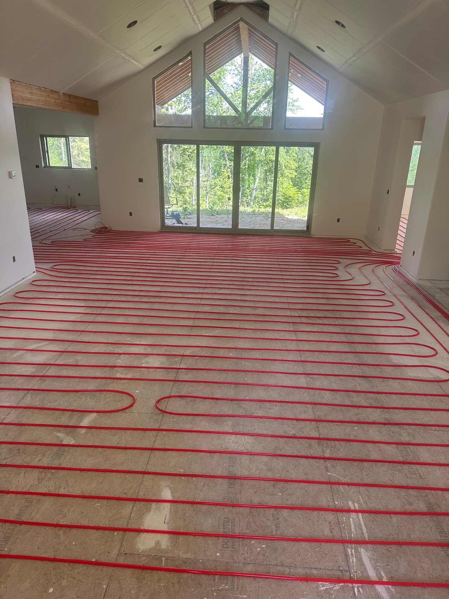 Radiant Heating Tubing Laid Across a Full Open-Concept Home image