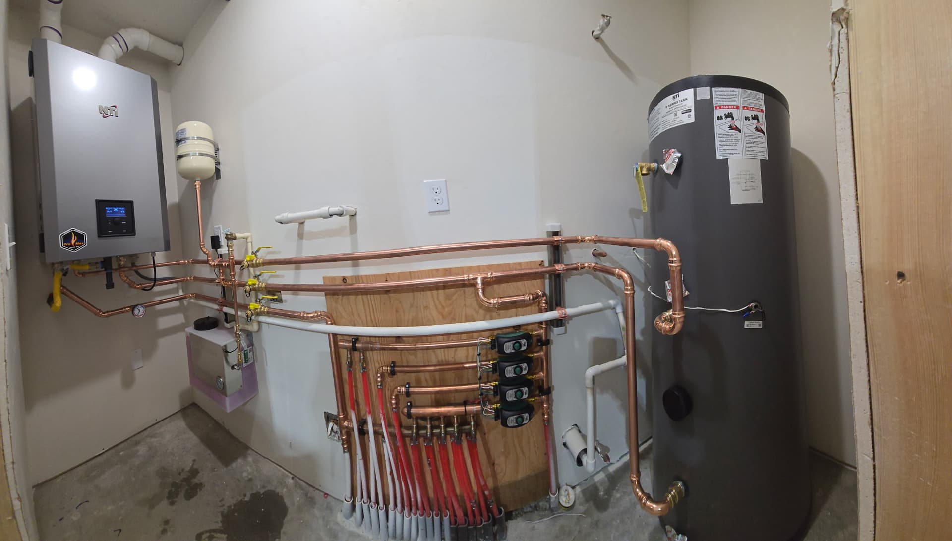 Wall-Hung NTI Boiler Install with Radiant Manifold and Indirect Tank image